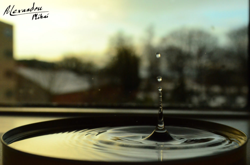 Water droplet with sunset reflection